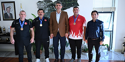KOCAMAN VETERAN GÜREŞÇİLERİNİ KABUL ETTİ
